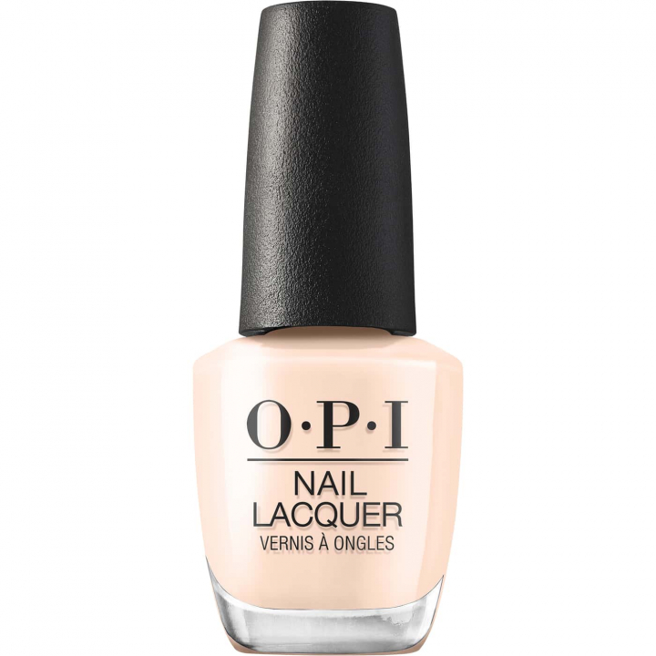 opi most requested throw me a wink nail polish in pale beige nude with a warm undertone and a soft, glossy sheer finish