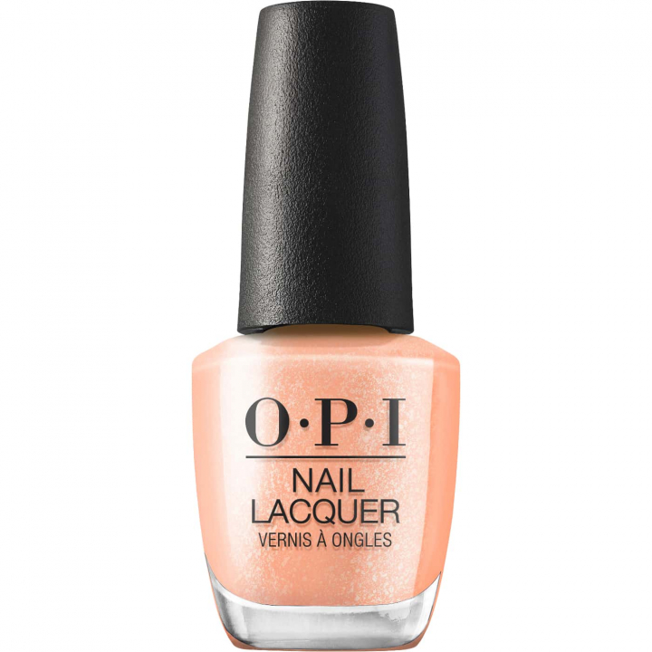 Warm peach orange shade with soft pearlescent shimmer opi queens rule nail polish in a warm peach orange shade with delicate pearlescent shimmer creating a soft luminous and elegant look
