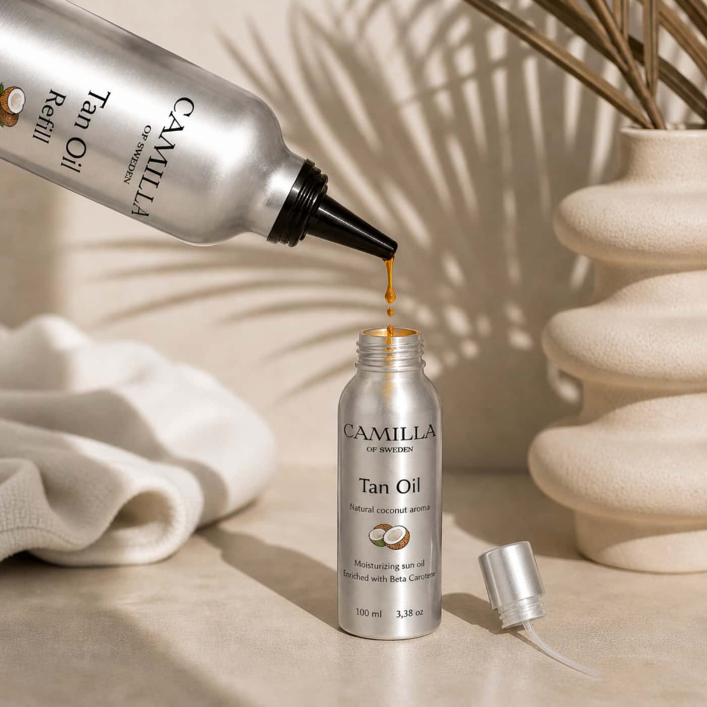 Camilla of Sweden Tan Oil Refill Coconut lightweight tanning oil with coconut aroma and glow finish