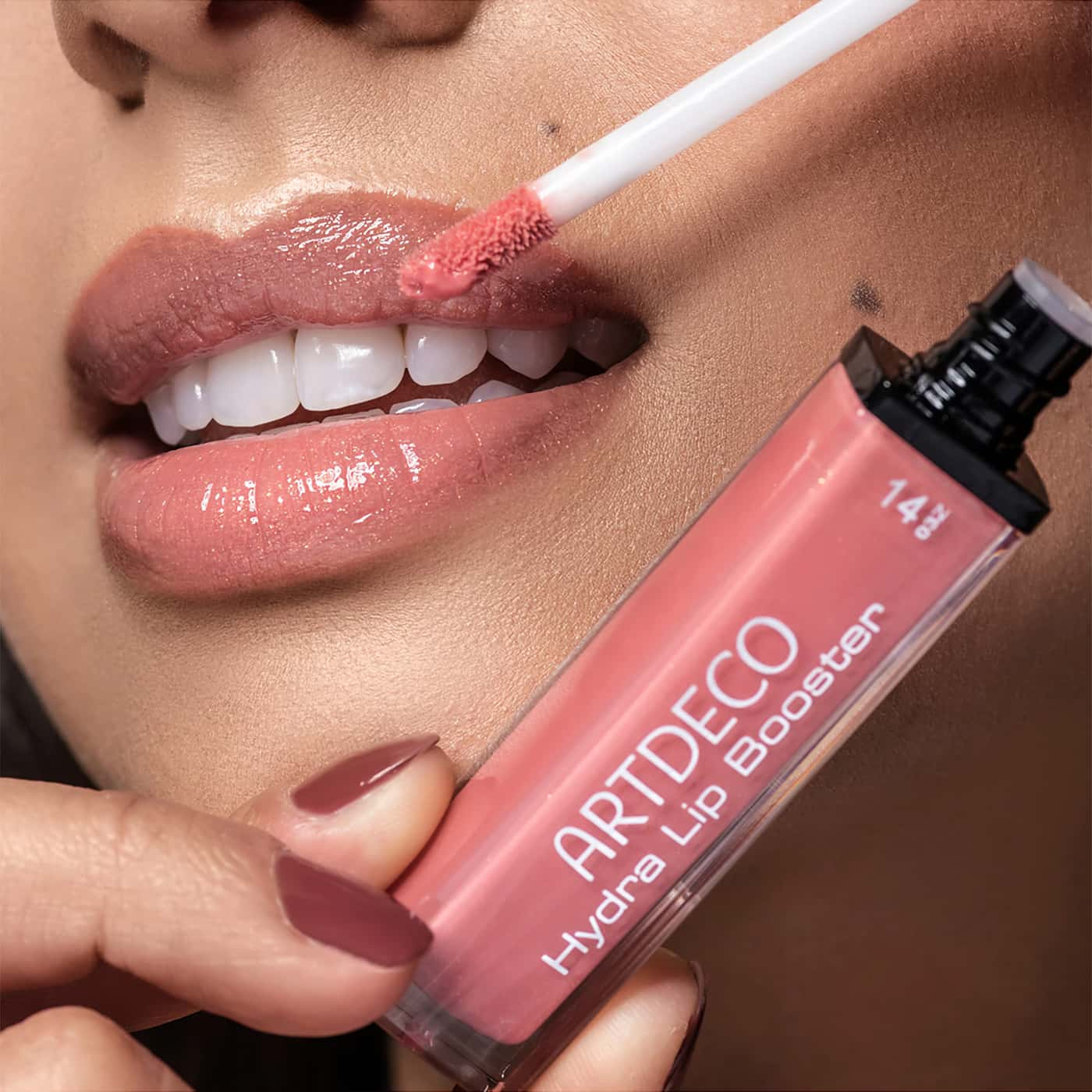 Artdeco Hydra Lip Booster No.14 – Transparent lip gloss in shimmering coral shade with hydrating and plumping effect
