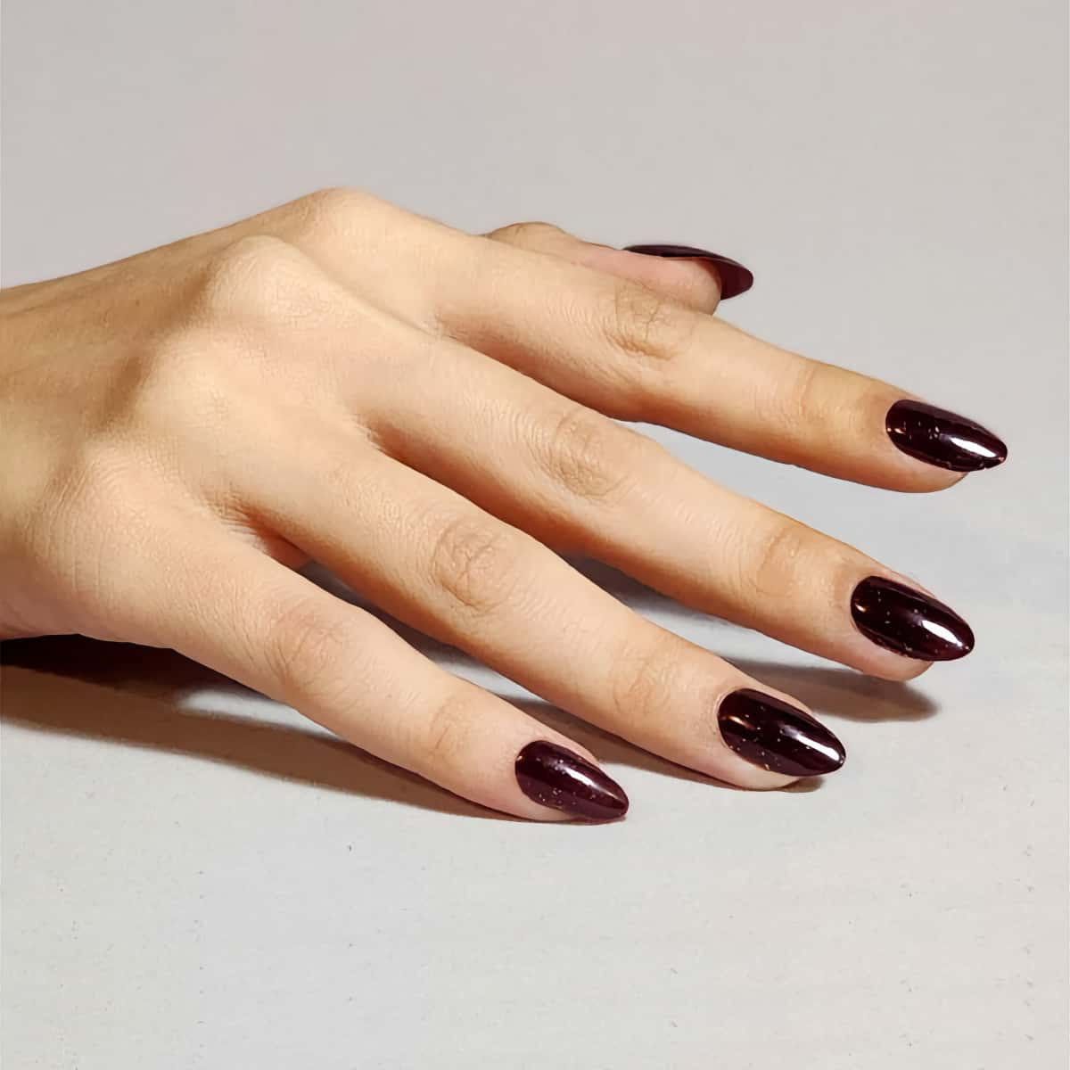 CND Vinylux Poison Plum - Enchanting Bordeaux Red with Glitter