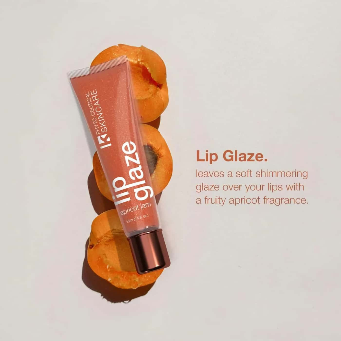 Lip gloss with apricot scent – hydrates and softens lips with a shimmering finish – natural ingredients like jojoba oil 