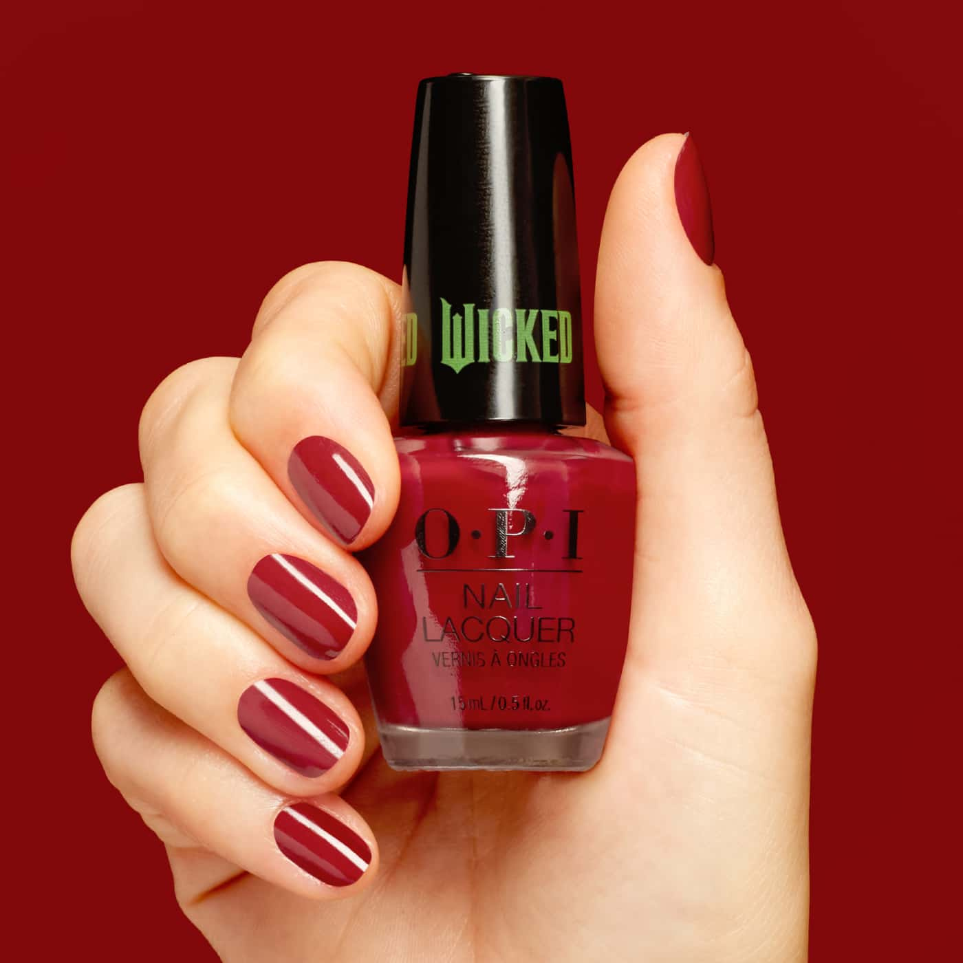 OPI Wicked Nessa-ist Rose - deep red crème shade for a bold and classic look, ideal for both everyday and festive occasions