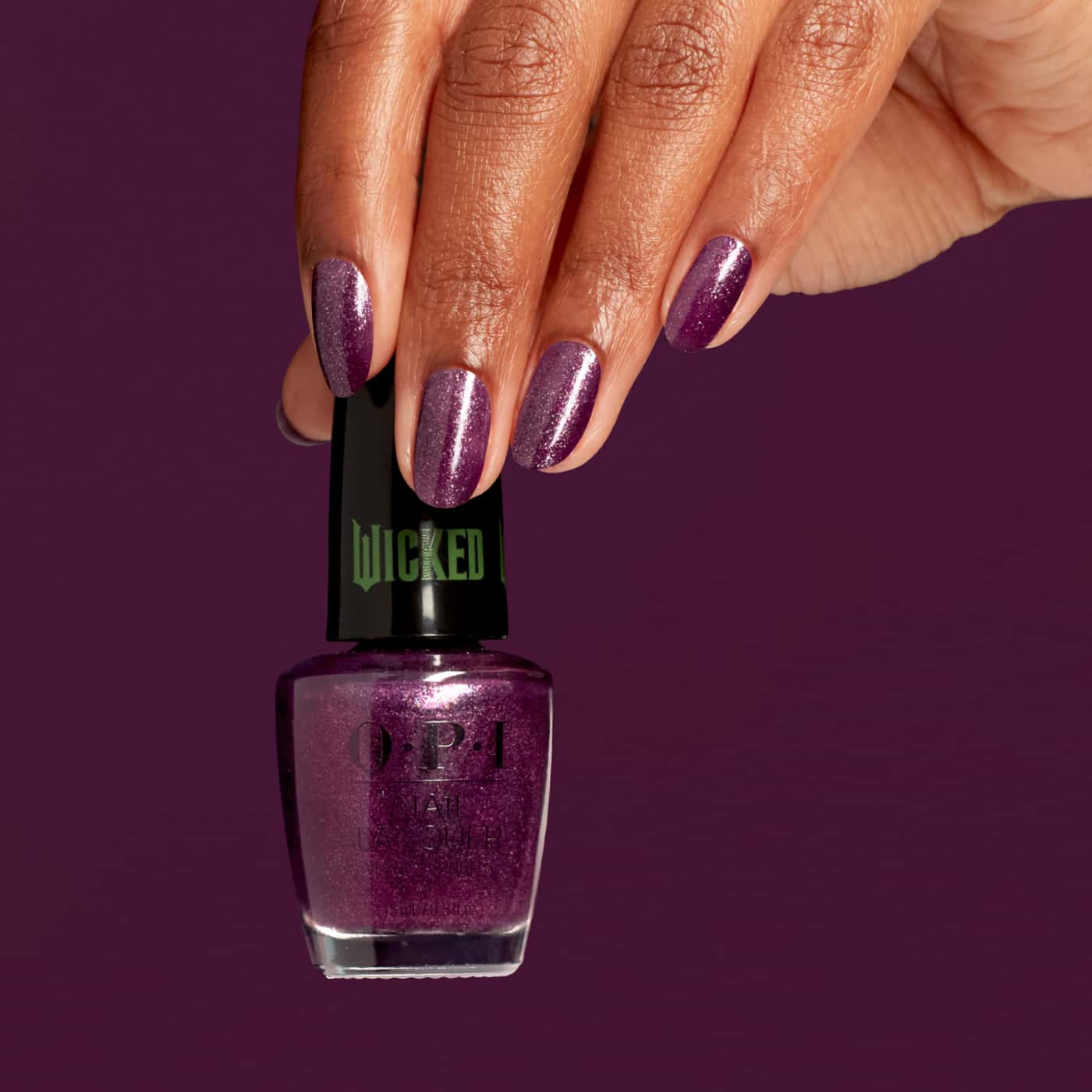 OPI Wicked Let''s Rejoicify - purple polish with red and gold shimmer, ideal for a festive and magical look