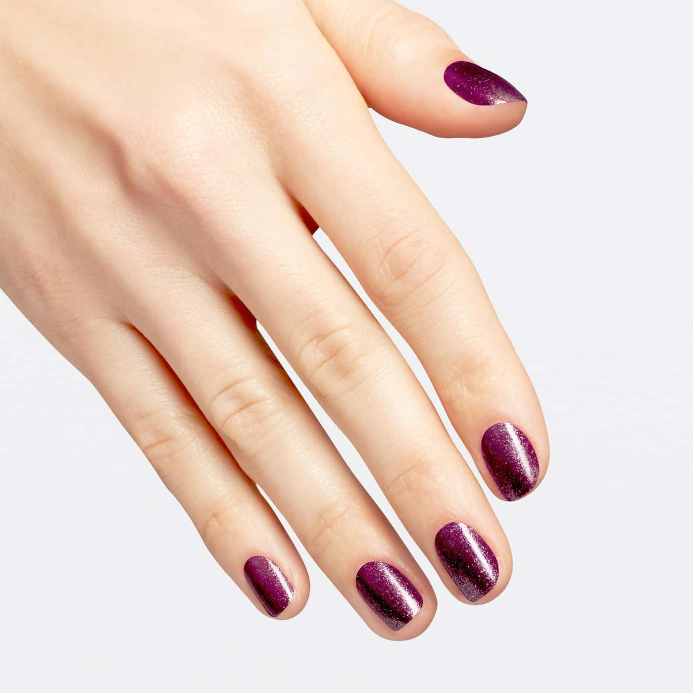 OPI Wicked Let''s Rejoicify - purple polish with red and gold shimmer, ideal for a festive and magical look