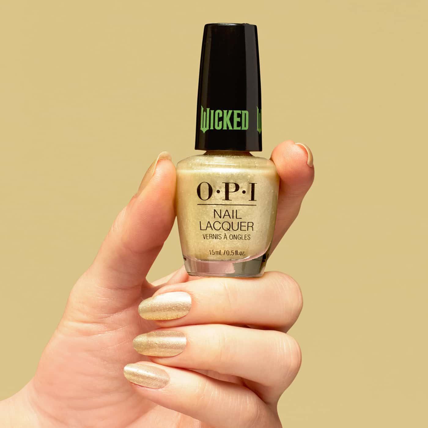 OPI Wicked Oz-mazing - light gold shimmer shade for a luxurious manicure, ideal for elegant and festive occasions