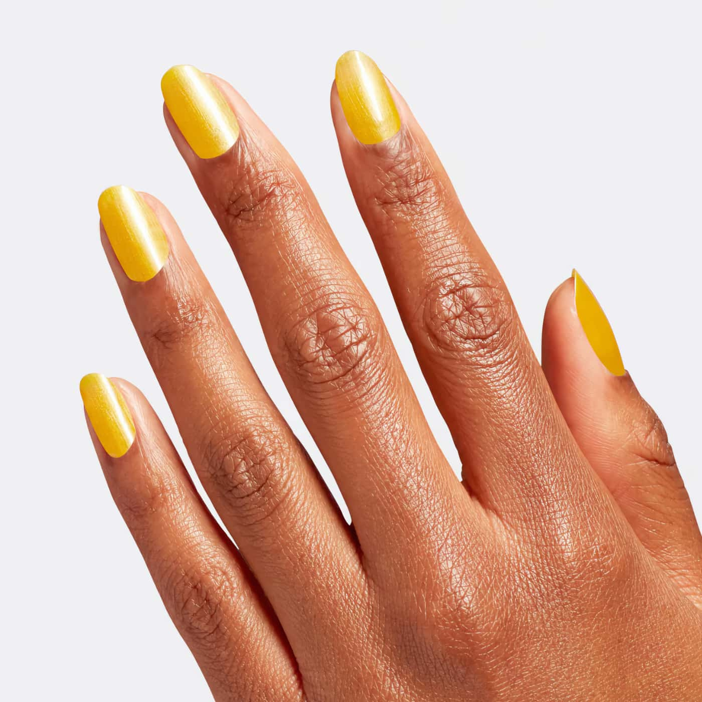 Vibrant yellow nail polish from OPI Wicked collection, perfect for a playful and refreshing manicure that brightens your nails.