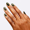 OPI Wicked Ozmopolitan - Olive green nail polish with shimmer Olive green nail polish with subtle bronze shimmer from OPI Wicked collection, ideal for a modern and sophisticated look.