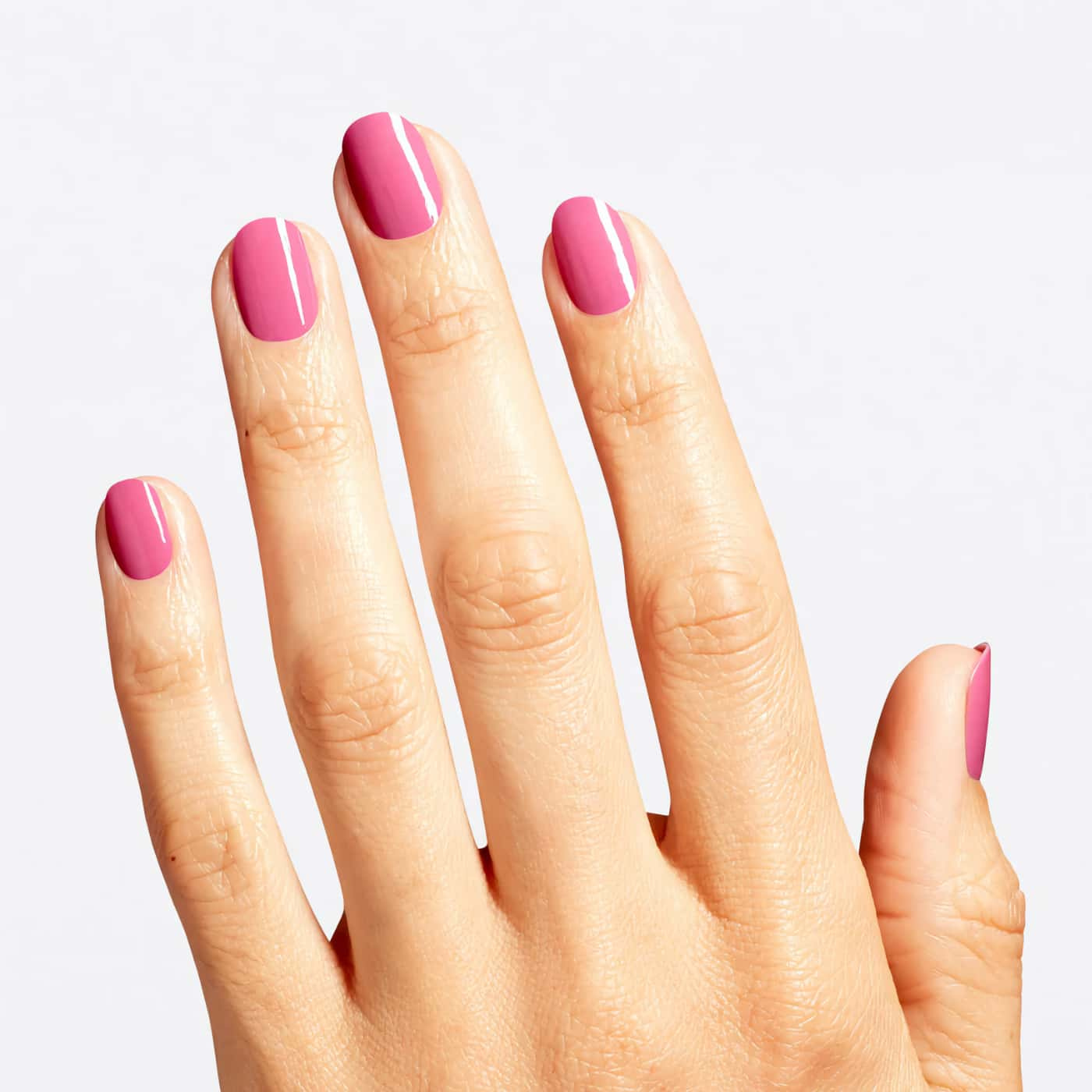Light pink nail polish from the OPI Wicked collection, ideal for a playful and fresh manicure perfect for any occasion.