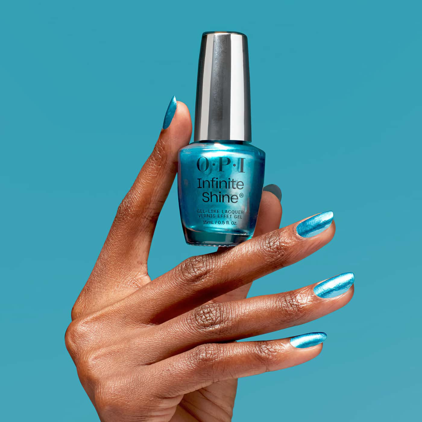 Nail polish in vibrant turquoise blue shade with subtle pearlescent shimmer – OPI Infinite Shine MillenniYUM, for a fresh and modern look.