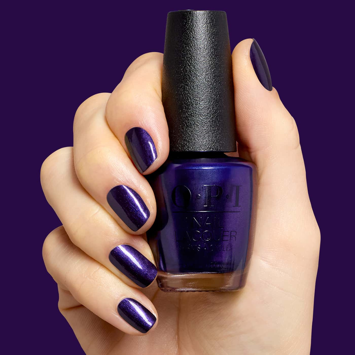 opi most requested don’t over ink it nail polish in deep blue-violet with indigo tone, subtle shimmer and glossy finish