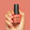 OPI Keep It Surreal - Coral-pink shimmering polish OPI Keep It Surreal - Shimmering coral-pink nail polish for a playful and lively manicure