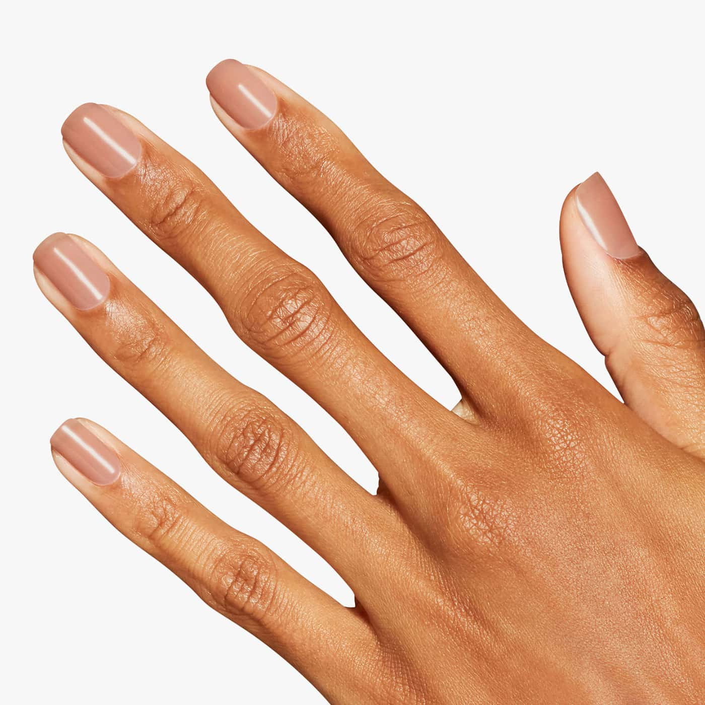 opi put it in airplane mode nail polish in a warm nude brown shade with a creamy finish that feels soft, clean and elegantly balanced