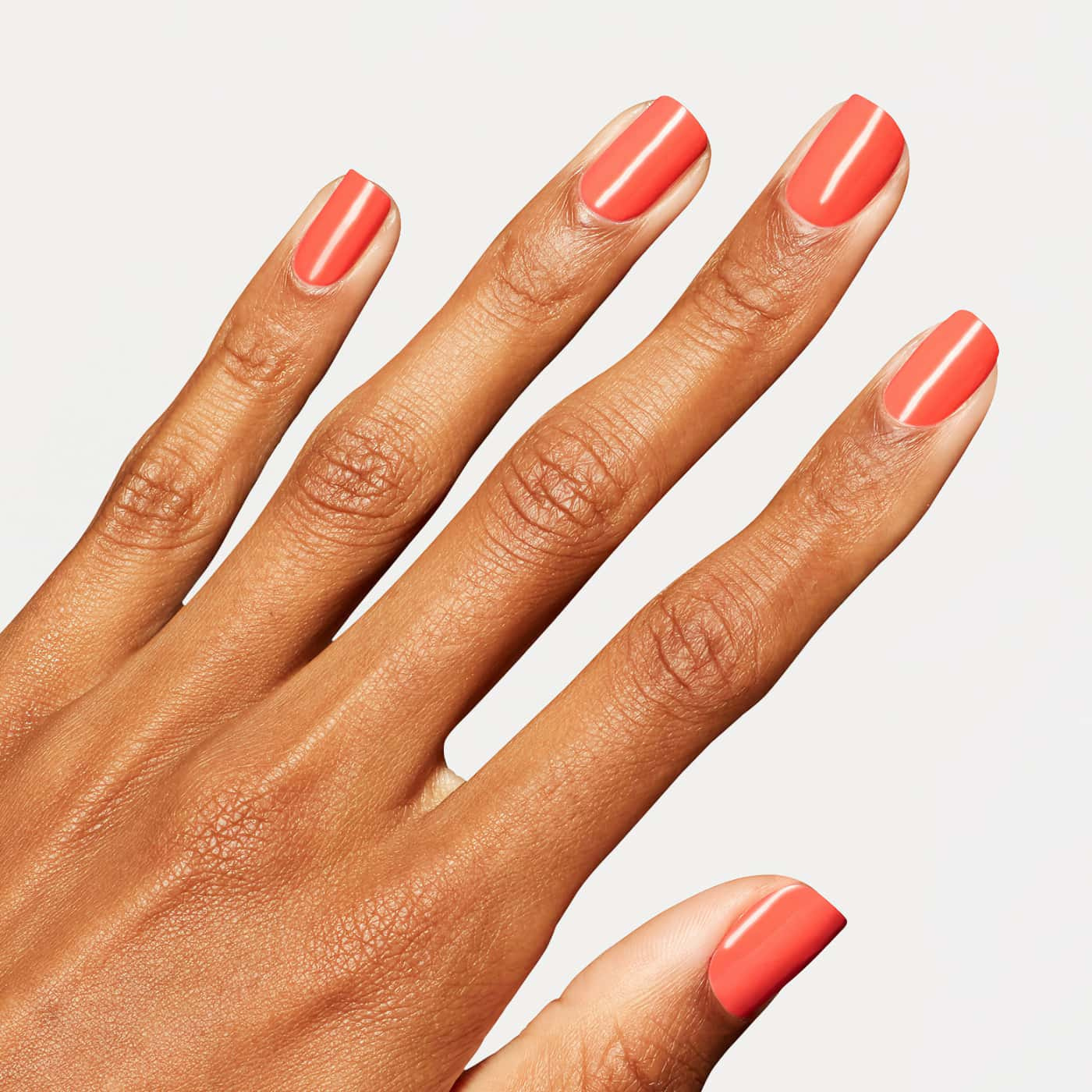 opi opicons shrimp cocktail nail lacquer in creamy coral orange shade with fully opaque finish and smooth surface