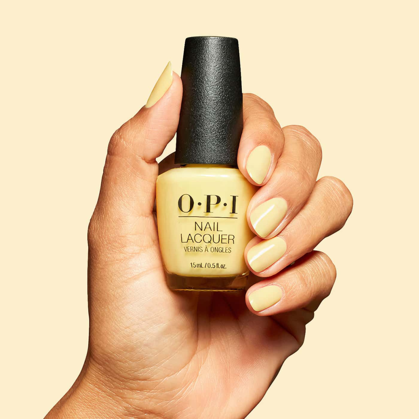 opi opicons sunny bunny nail polish in a light pastel yellow shade with warm undertone and creamy finish, even color with soft appearance